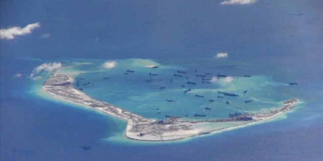 FILE PHOTO -  Chinese dredging vessels are purportedly seen in the waters around Mischief Reef in the disputed Spratly Islands in the South China Sea in this still image from video taken by a P-8A Poseidon surveillance aircraft provided by the United States Navy May 21  2015   U S  Navy Handout via Reuters File Photo  ATTENTION EDITORS - THIS PICTURE WAS PROVIDED BY A THIRD PARTY  REUTERS IS UNABLE TO INDEPENDENTLY VERIFY THE AUTHENTICITY  CONTENT  LOCATION OR DATE OF THIS IMAGE  THIS PICTURE IS DISTRIBUTED EXACTLY AS RECEIVED BY REUTERS  AS A SERVICE TO CLIENTS  EDITORIAL USE ONLY  NOT FOR SALE FOR MARKETING OR ADVERTISING CAMPAIGNS       TPX IMAGES OF THE DAY