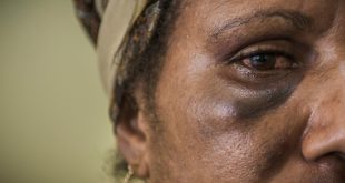 Cathy Wisil, 34, consulting at the family support centre in Port Moresby following inter-partner violence