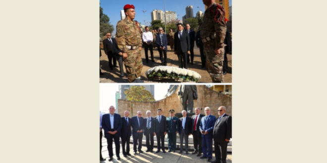 مرقص إكليلًا على تمثال بشارة الخوري