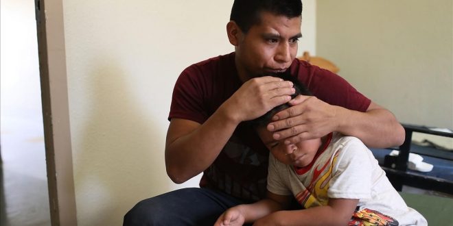 EL PASO  TX - JULY 19  A man  identified only as Antonio   hugs his son  Vauldio  7  in an Annunciation House facility after they were reunited yesterday on July 19  2018 in El Paso  Texas  The two  orginally from Guatemala  were reunited in an I C E processing center after being separated for two and one half months when they tried to cross into the United States  A court-ordered July 26th deadline is approaching for the U S  government to reunite as many as 2 551 migrant children ages 5 to 17 that had been separated from their families    Joe Raedle Getty Images AFP    FOR NEWSPAPERS  INTERNET  TELCOS   TELEVISION USE ONLY